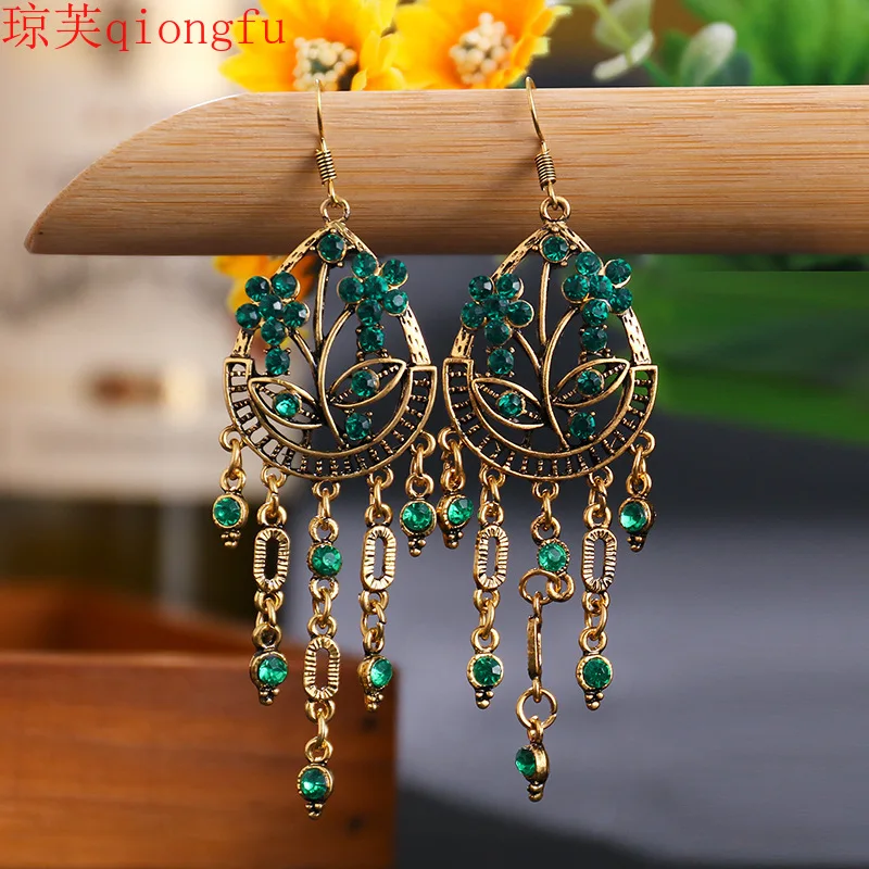 

Fashion Korean personality long style new plum blossom earrings texture hollow earrings diamond alloy earrings boho style