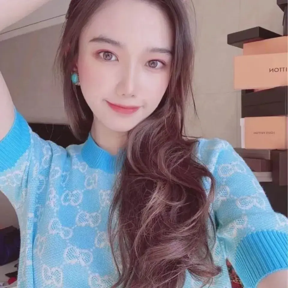 

2021 spring new top letter jacquard knitwear middle sleeve temperament round neck sweater trend
