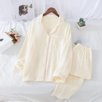 fashion spring and autumn new couple cotton crepe suit long sleeved trousers womens pajamas solid color home service men