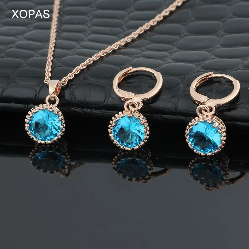 Комплект женских серег из розового золота 585 пробы с разноцветным