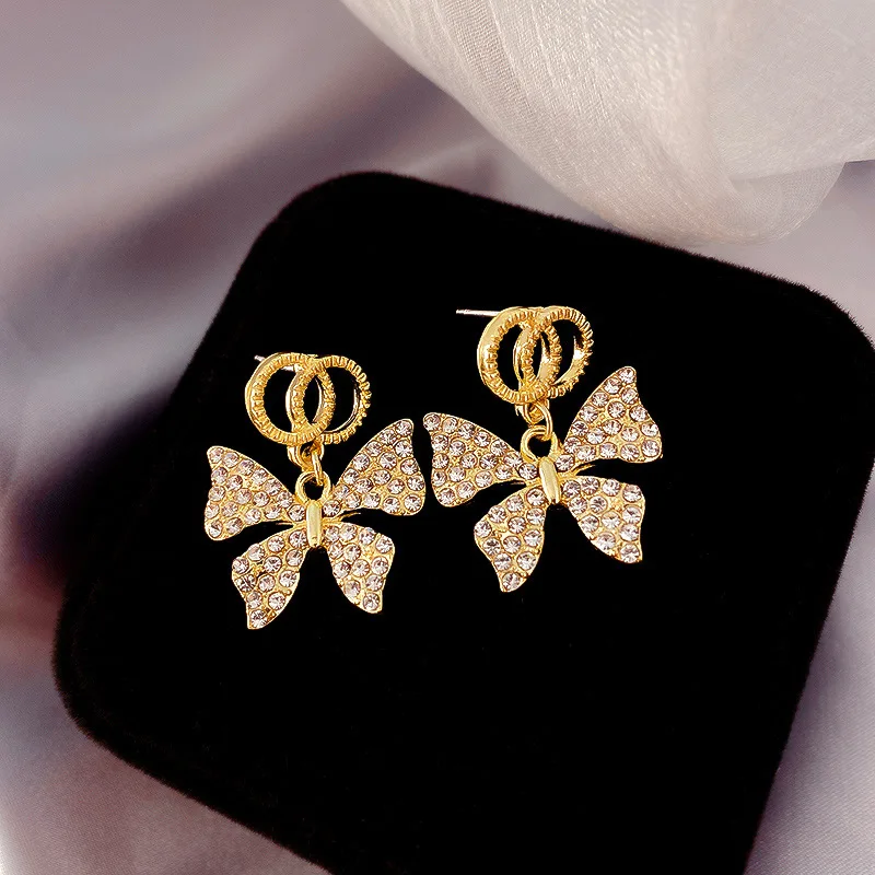 

Cute Female Crystal Small Butterfly Earrings Trendy Gold Color Stud Earrings For Women Charm White Zircon Wedding Earrings