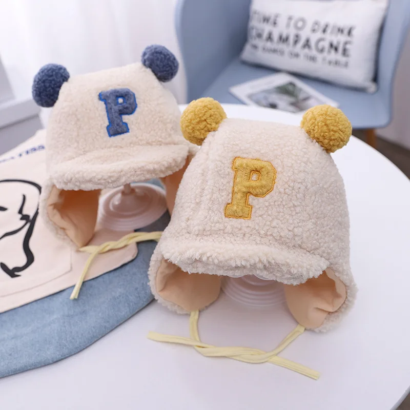 

Pompom Baby Winter Korean Warm Simple Lamb Wool Girl Letter Earflap Caps for Children Lei Feng Hat Kids Toddler Bonnet