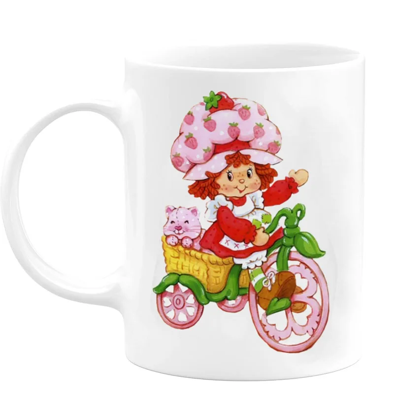 Маленькая Клубничка девочка с розовым котом на прекрасном велосипеде забавные