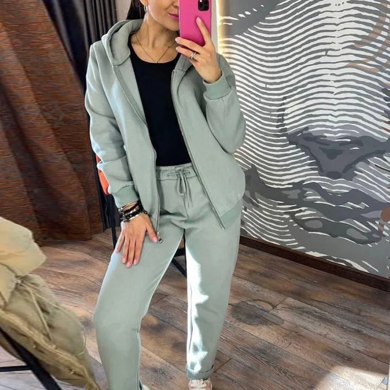 

2021 autumn and winter new style women's fashion long sleeve sports and leisure sweater with hat two piece set