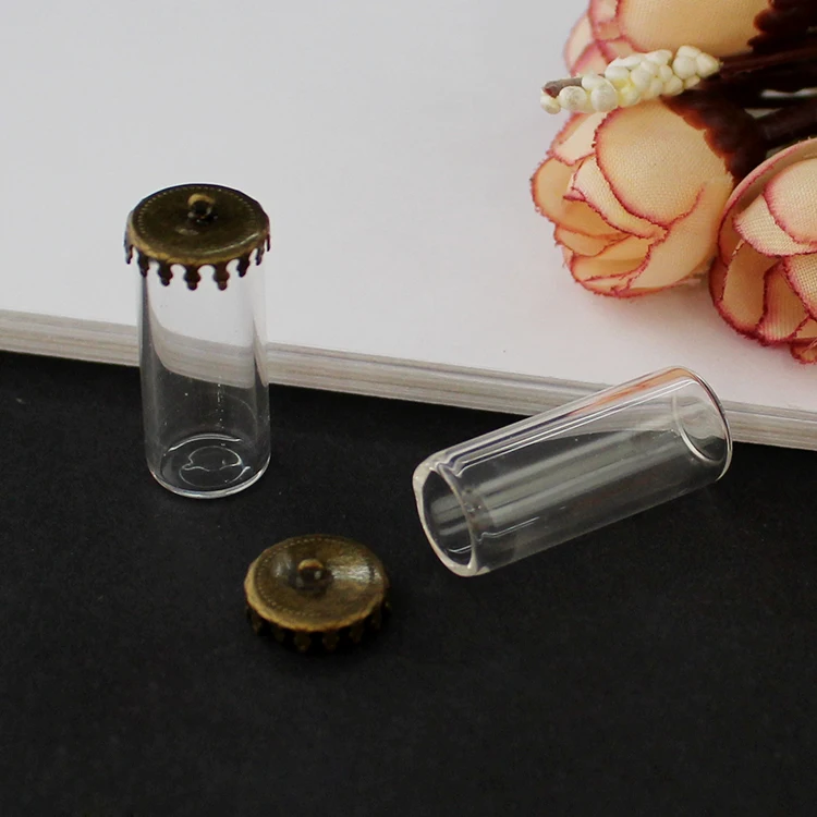 Стеклянная трубчатая бутылка с короной и металлической крышкой стеклянные