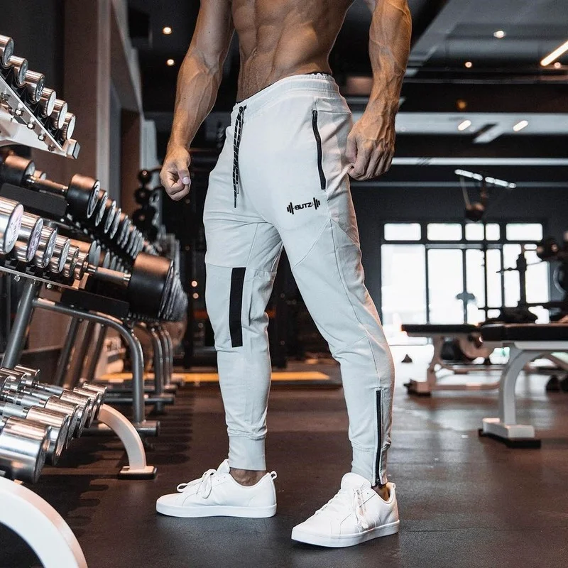 

New men's casual sports trousers, men's fitness trousers, running training, zipper feet pants