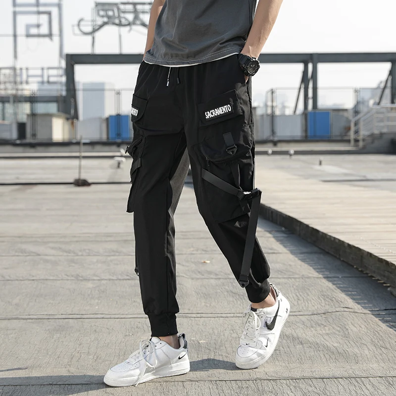 

2021Ready StockMen Ribbons Color Block Black Pocket Cargo Pants Harem Joggers Harajuku Sweatpant Male Hip Hop Trousers