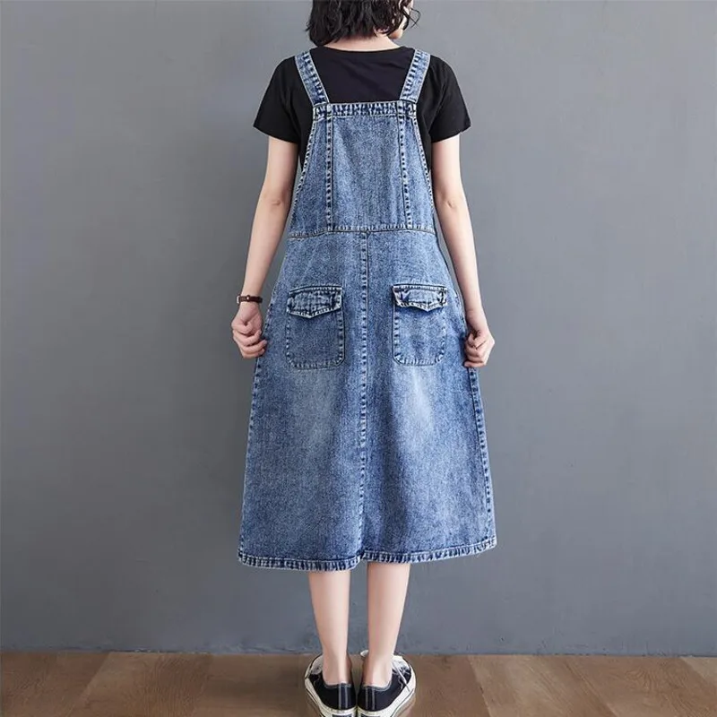 Женское джинсовое платье комбинезон #2445 черно синее однобортное свободное