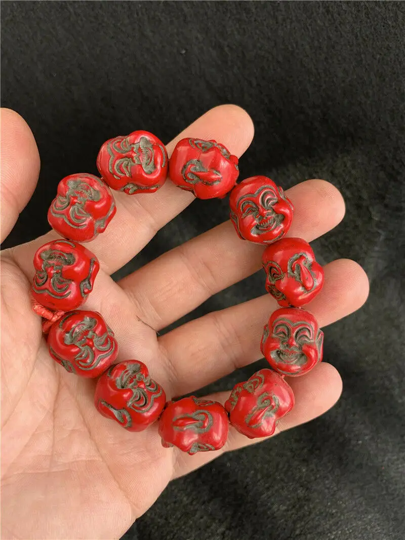 

Chinese Red Cinnabar Hand-carved Maitreya Buddha head beads Bracelet