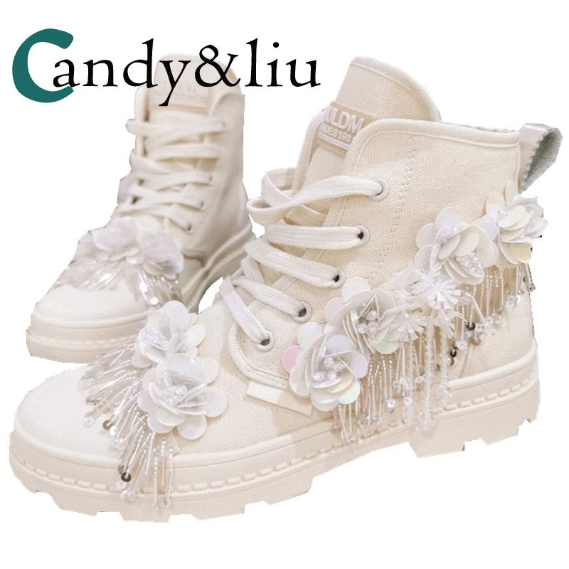 

Fashionable Korean beige and foreign style individual tassel bright piece flower thick bottom women's lace up