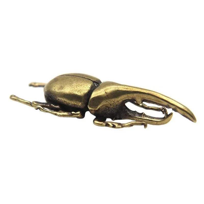 

Медные фигурки жуков