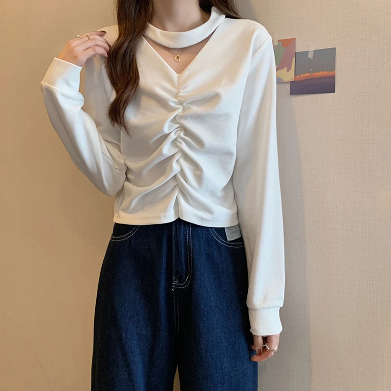 

V-neck hollow neck design sense niche 2021 new autumn short fried street slim pleated blouse women.