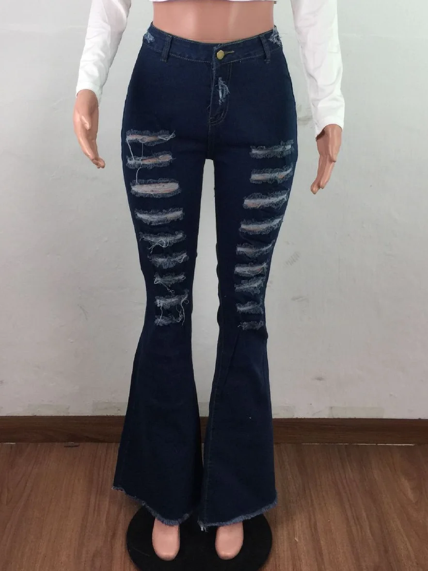 Джинсы женские рваные расклешенные с высокой талией дырки в джинсах |