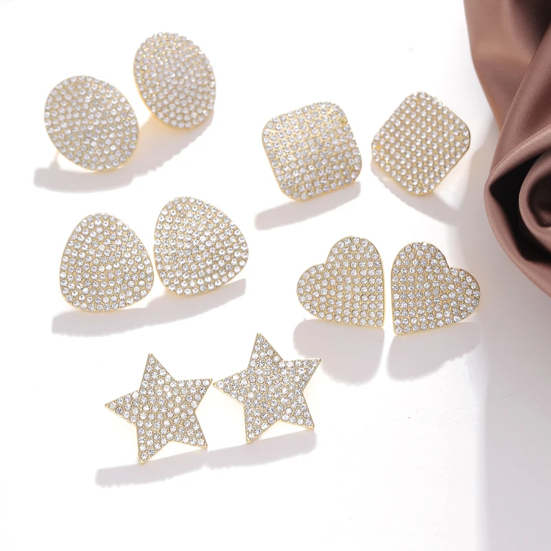 Простые серьги-гвоздики с микрозакрепкой из циркония золотого цвета в форме