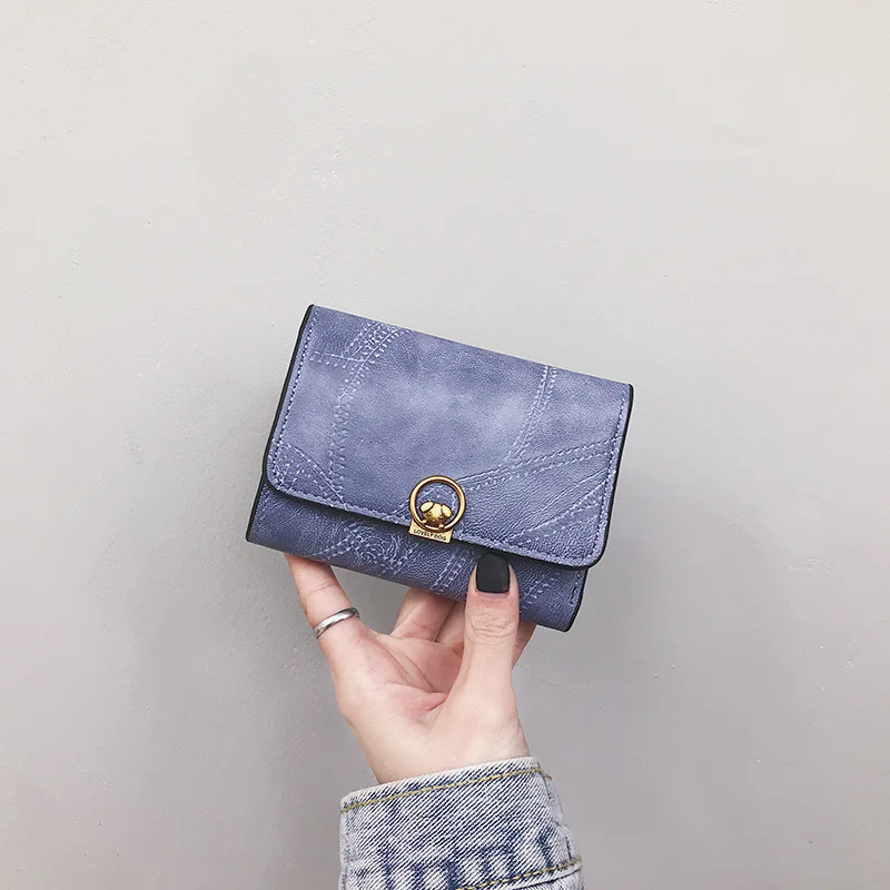 

TheNew KoreanVersionOf The Small Wallet Female Short European And AmericanIns Retro Simple Buckle Card Bag Soft WalletCoin