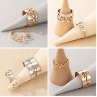 docona new trendy letter flame matching couple rings for women men hollow geometric open alloy metal wedding ring jewelry %d0%ba%d0%be%d0%bb%d1%8c%d1%86%d0%b0