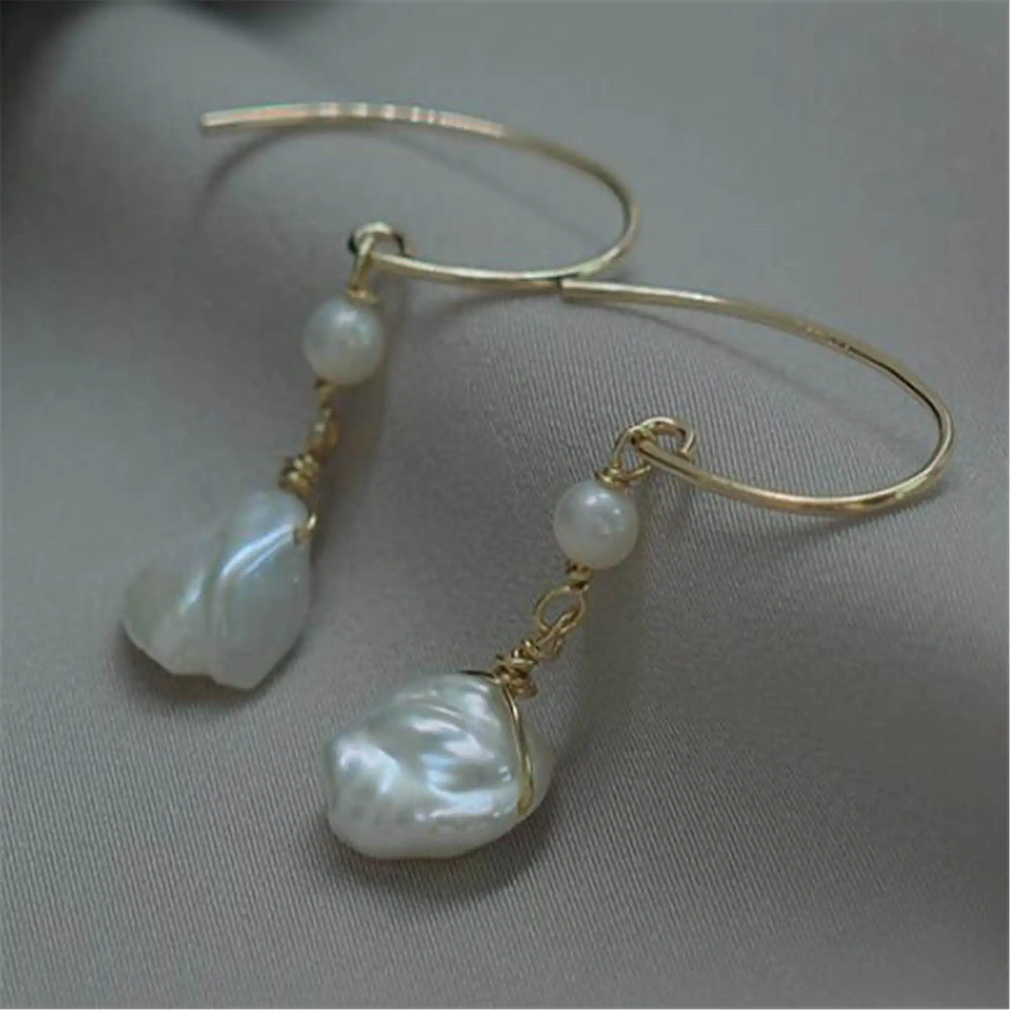 

Серьги с белым жемчугом в стиле барокко, 18 К, Type C