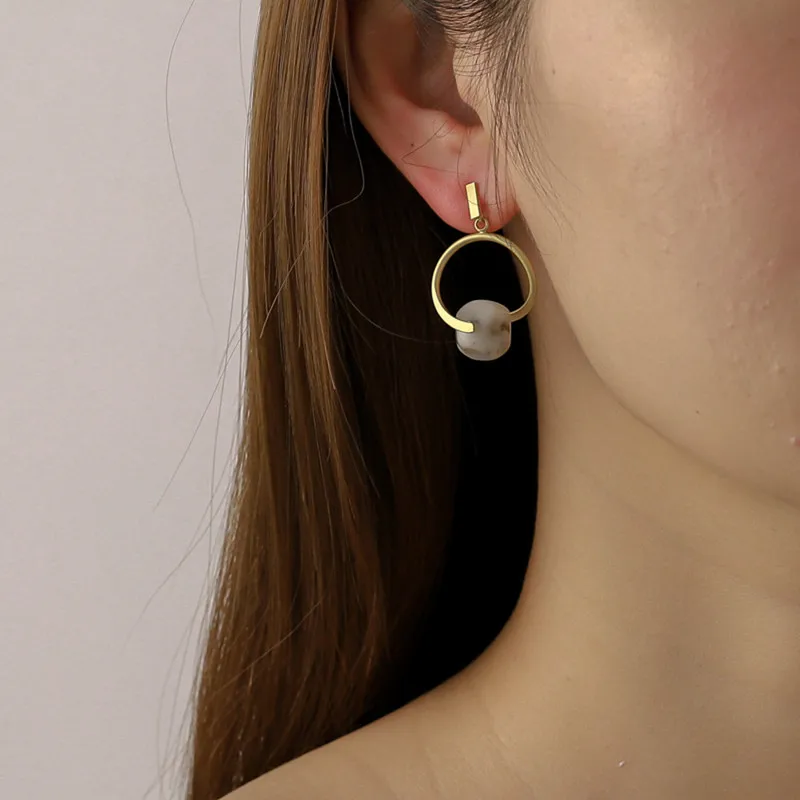 

Cool wind simple geometric resin ball earrings commuter patterned metal earrings