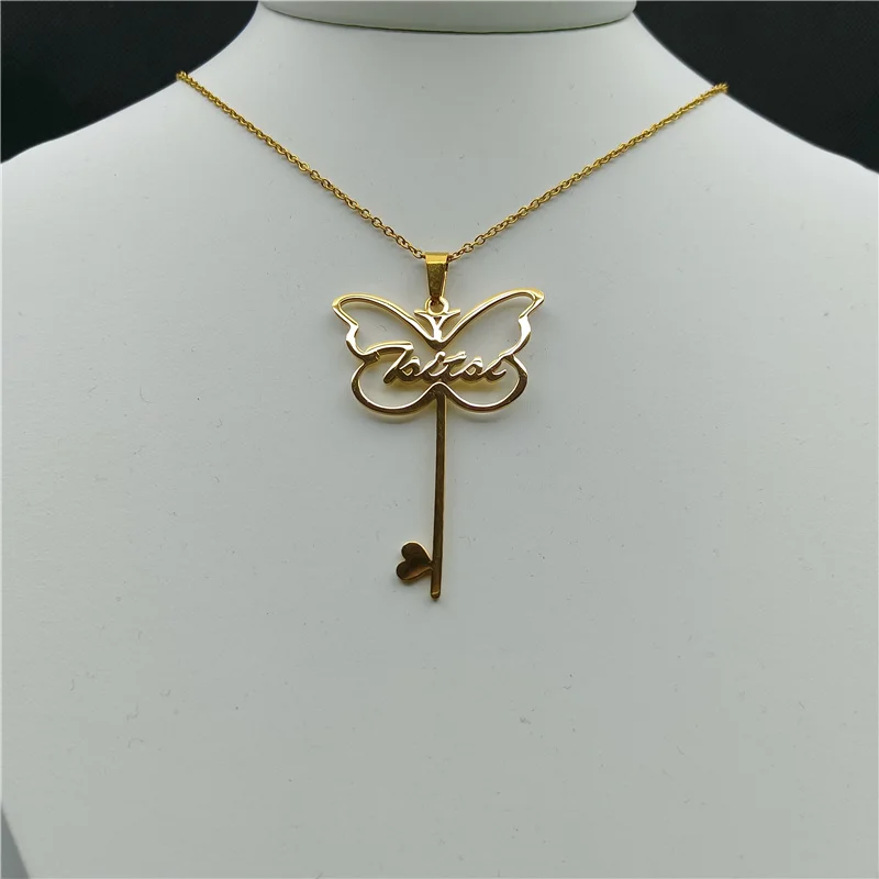 

Ожерелье с подвеской в виде ключа-бабочки из нержавеющей стали