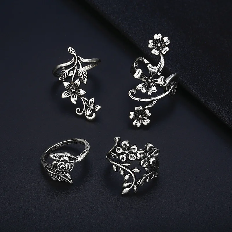European and American pop fashion personality Ancient silver hollow carved flowers 4 rings set set men and women hand jewelry