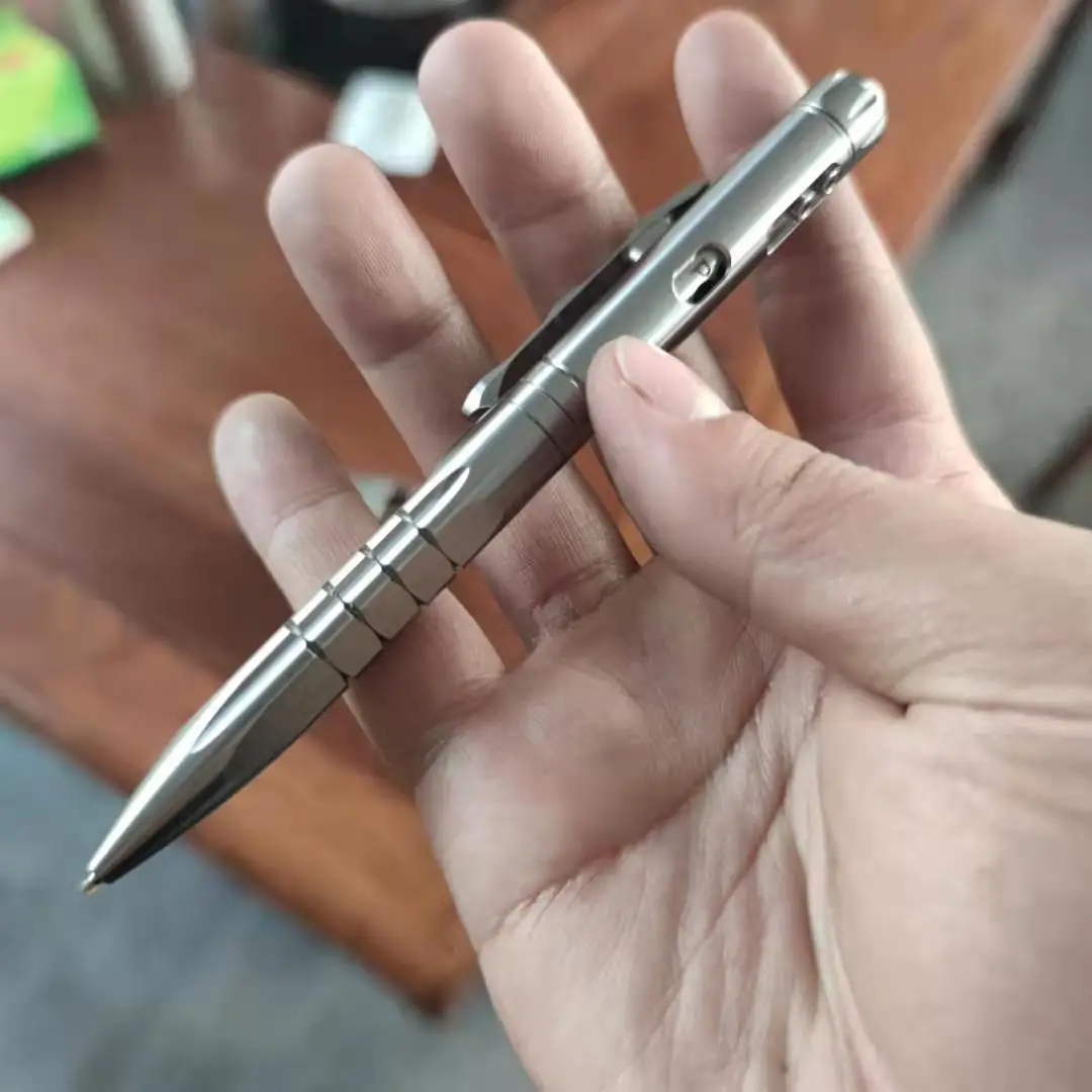Online EDC Titanium Paduan Serat Karbon Pen Segitiga Disesuaikan Rusak Pola Pena Taktis