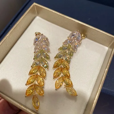 

Concave Shape European And American Golden Wheat Gradient Yellow Leaf Tassel Earrings For Female Personality Hipster Earrings