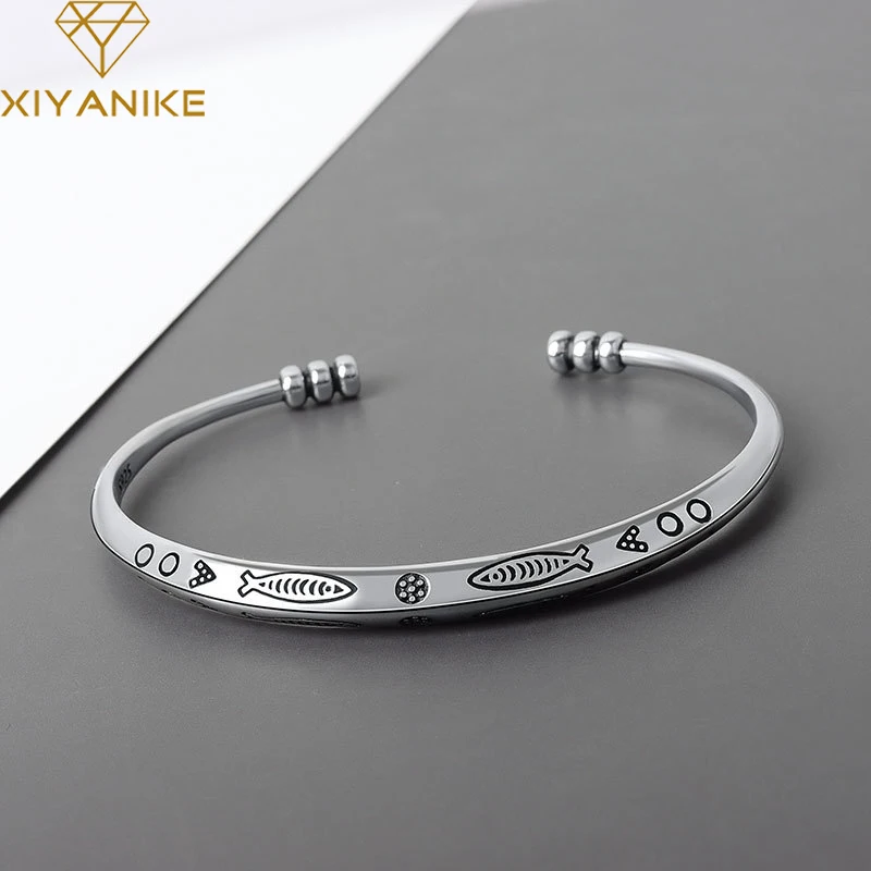 XIYANIKE – Bracelet Triangle en forme de poisson pour femme  couleur argent  Style ethnique