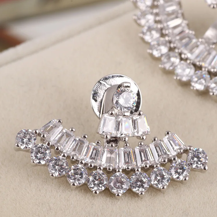 

Fan-shaped zircon inlaid curved silver creative earrings