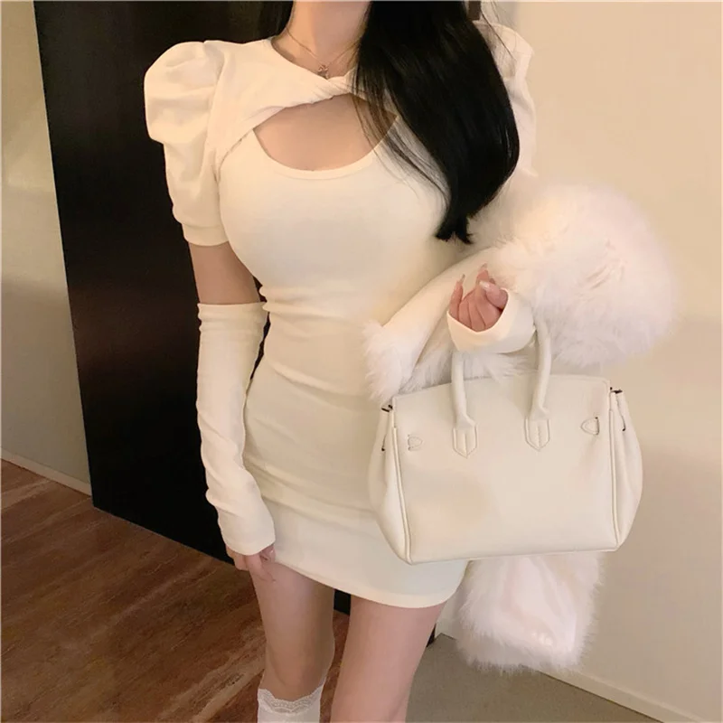 

New temperament, pure desire, sexy dress, new winter long-sleeved cover, be careful with the bag hip skirt inside the machine