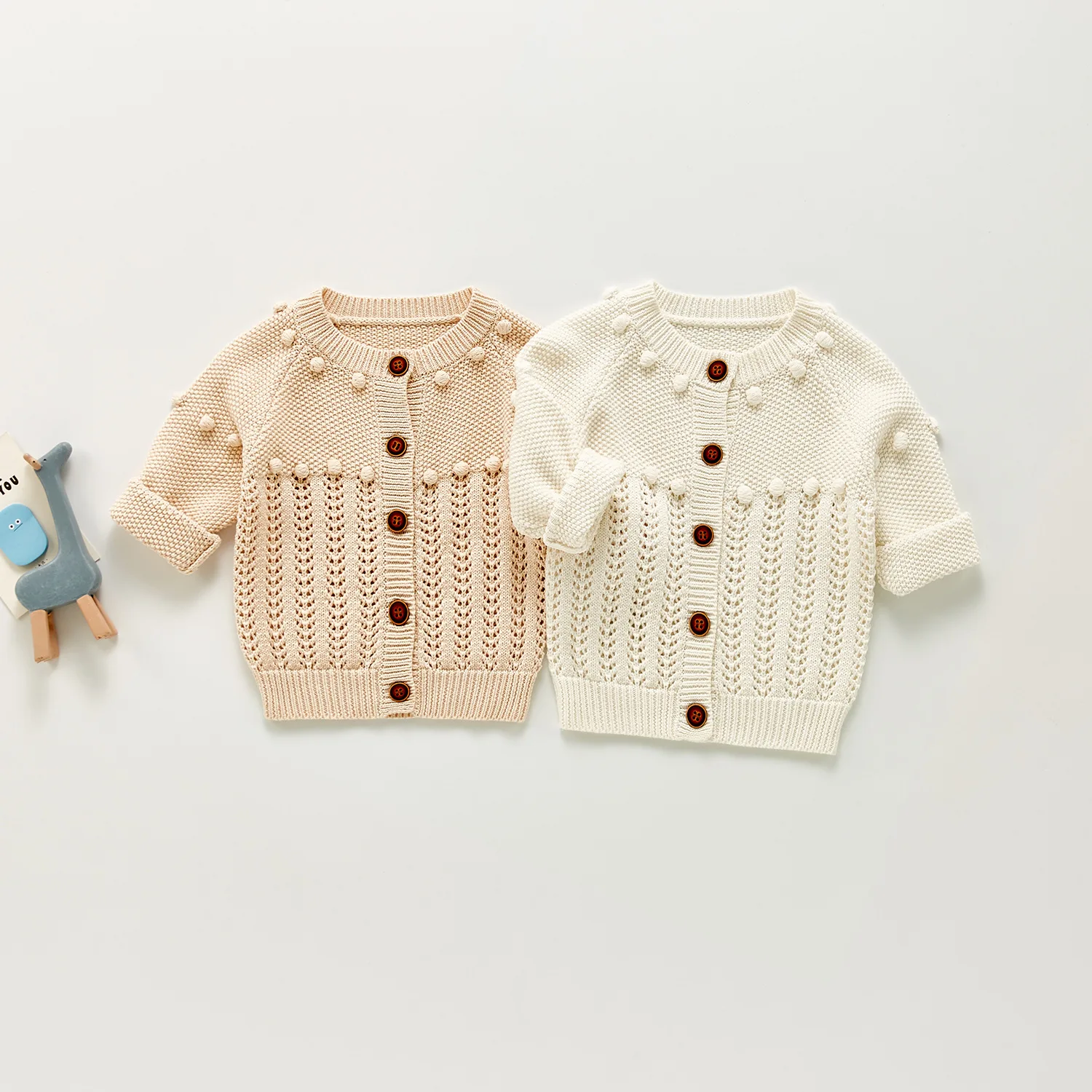 

Children's clothing girl baby autumn new simple bubble ball cardigan baby wool knitted coat