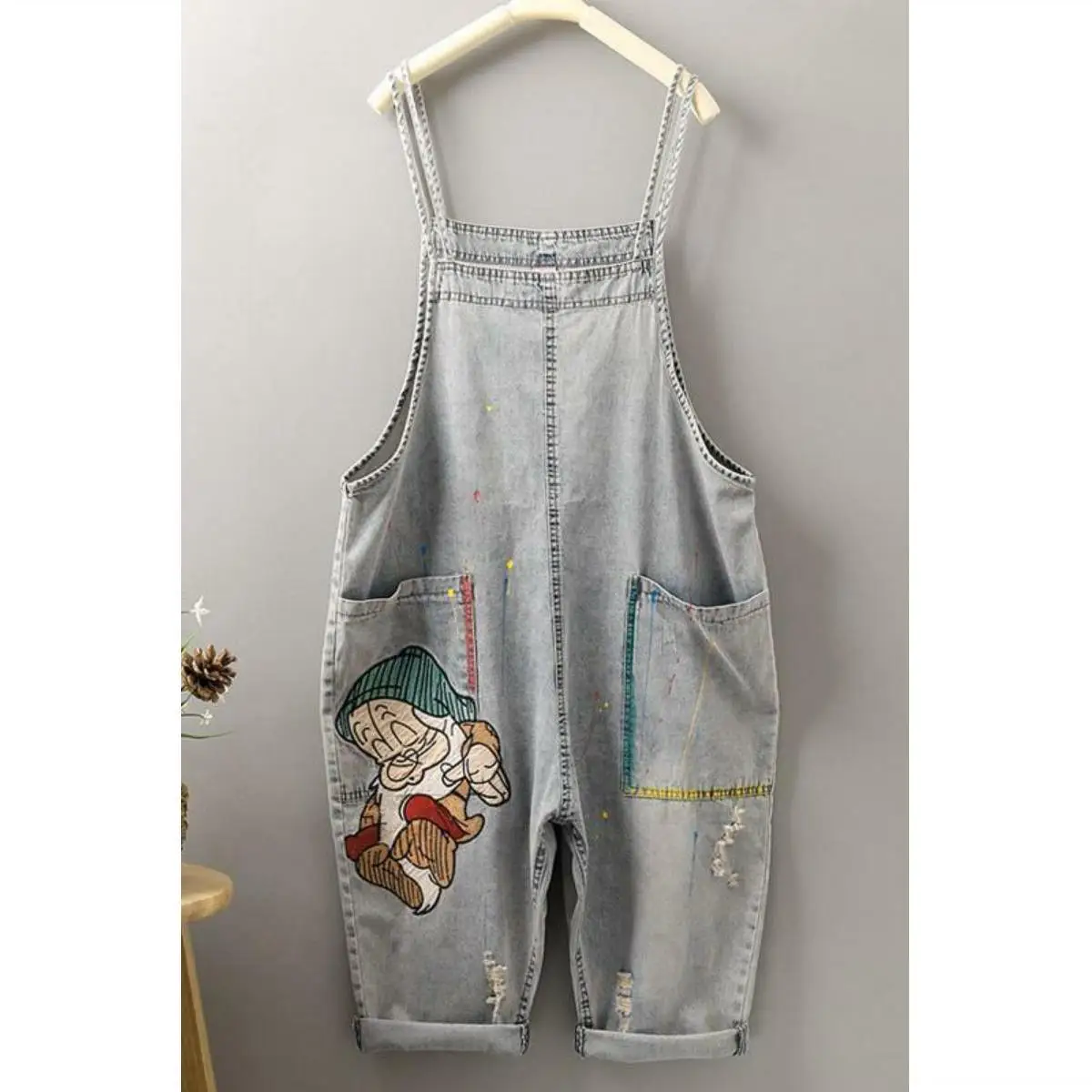 

Korean version 2021 spring and autumn fashion, age reduction, slim leisure, 9-point jeans, suspenders, women's cartoon printed