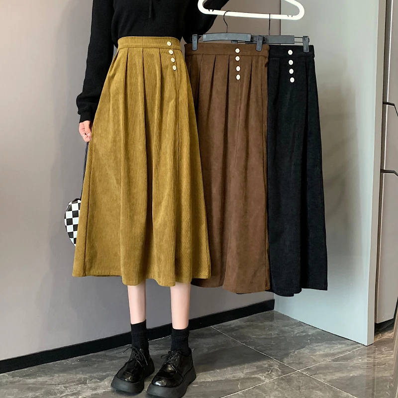 

Zoki Women Corduroy Skirts Winter Fashion Button Black Pleated Midi Skirts Casual A Line Korean High Waist Cotton Faldas Mujer