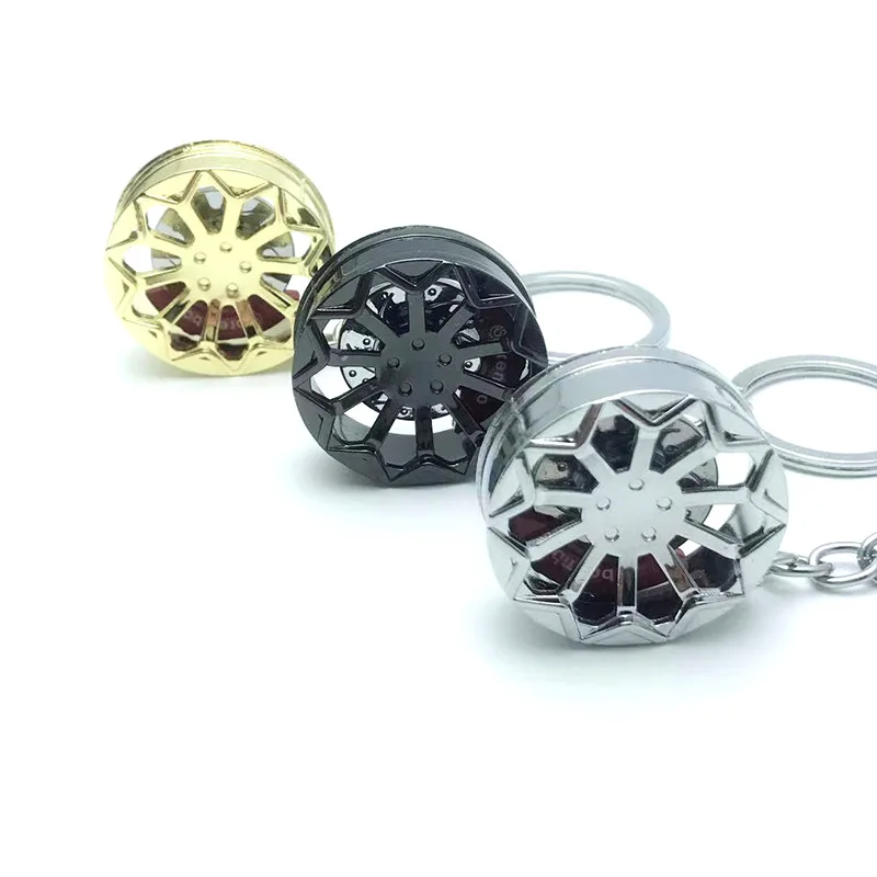 

Creative Car Key Chain Pendant Metal Simulation Modification Belt Brake Brake Sunflower Hub Key Ring Fashion Gift To a Friend