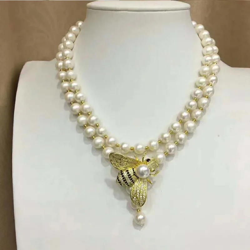 

Hot sell new super-American 9-10mm natural white freshwater pearl necklace 90cm long sweater chain micro zircon fashion jewelry