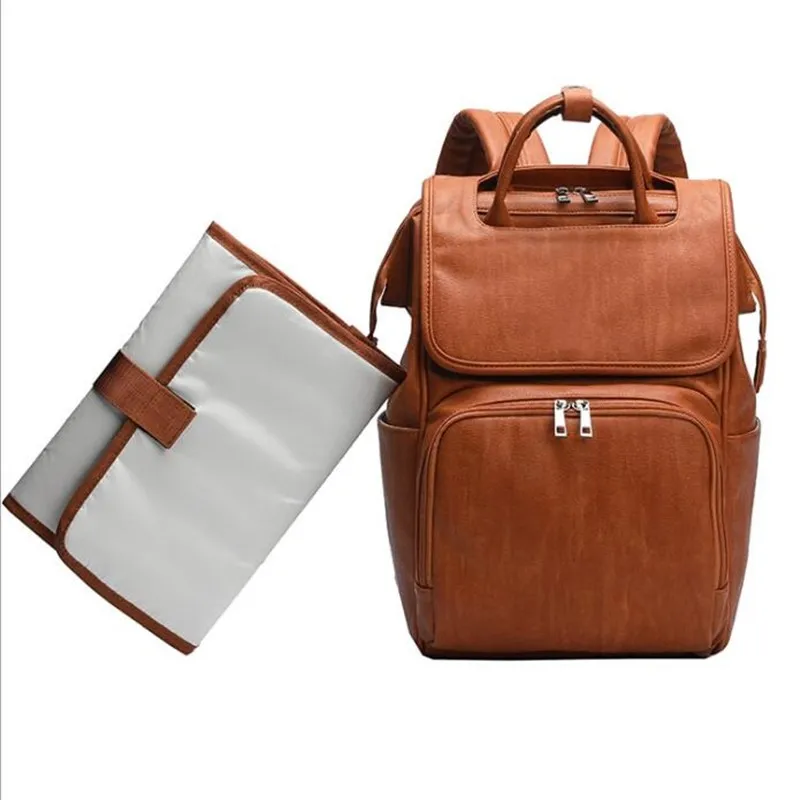 

New Unisex Fashion Quality PU Leather Baby Diaper Bag Backpack+Changing Pad+Stroller Straps