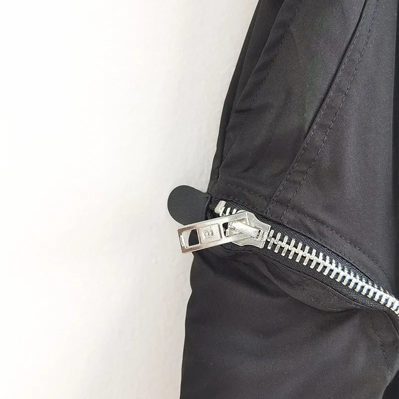 

Multi-Pockets Zippers Design Women Solid Black Loose Shorts Elastic Waist Drawstring Summer Fashion Straight Shorts High Street