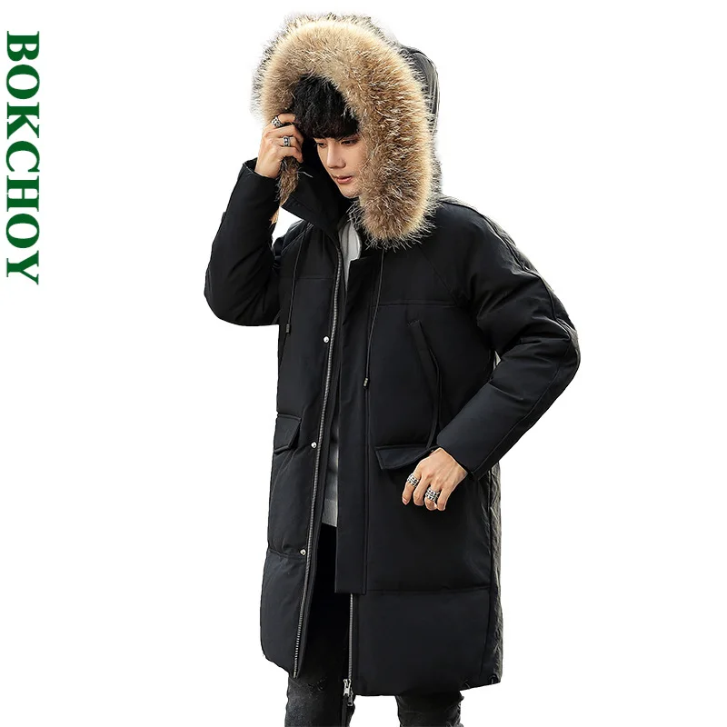 

Уплотненный теплый белый утиный мужской пуховик средней длины, Повседневный корейский пуховик с капюшоном и воротником из меха енота 925