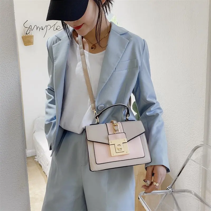 

2021 boutique brand diagonal cross-portable ladies bag simple one-shoulder color-blocking handbag top handle bags