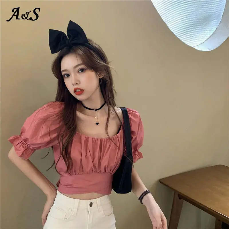 

Anbenser Fashion O Neck Open Back T-shirt Women Summer Sexy Backless Crop Tops Female Casual Puff Sleeve Cross Bow Short Tee Top