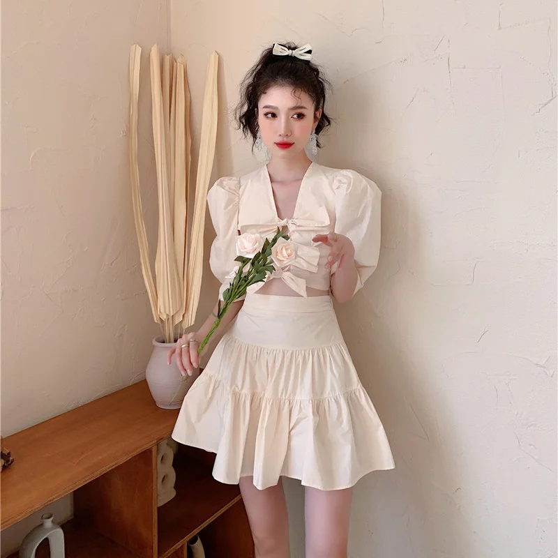 

Korejepo Women 2 Piece Set 2021 Summer New Sweet Fashion Suits Solid Bow Hollow Short Top High-waisted Thin Skirt Two-piece Suit