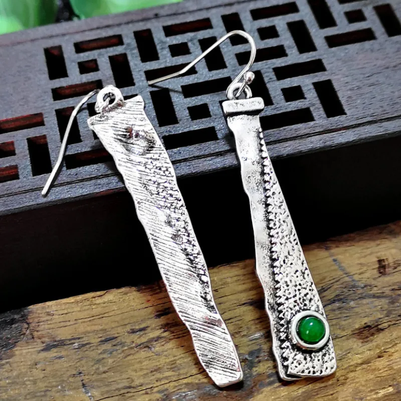 

New Retro Creative Sickle Serrated Pendant Earrings for Women 2021