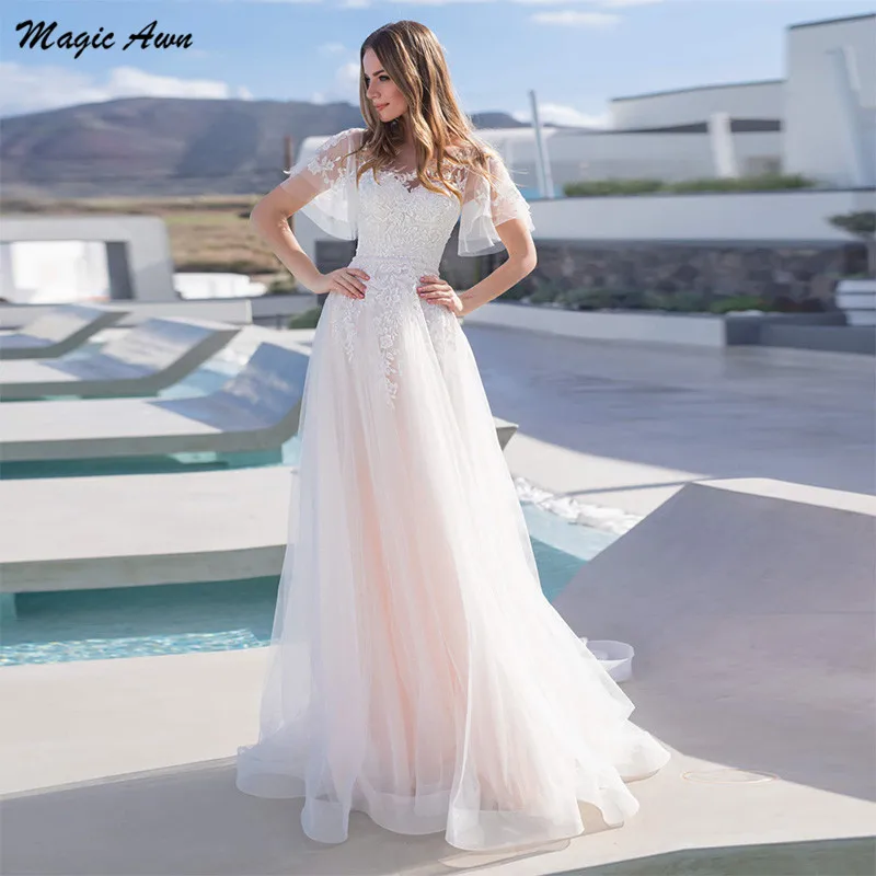

Magic Awn Charming Lace Tulle Wedding Dresses Light Pink Cap Sleeves Appliques Illusion Princess Modest Bride Dress A-Line 2021
