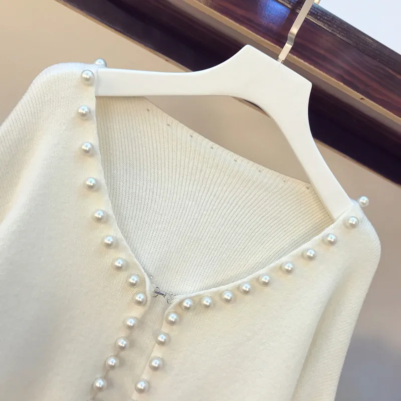 Женский длинный кардиган на пуговицах однотонный с контрастным принтом и