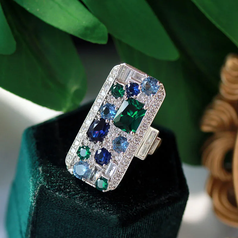 

Сверкающие прямоугольные Асимметричные кольца с зеленым и синим фианитом, Женские Ювелирные изделия, Открытое кольцо для коктейвечерние, т...