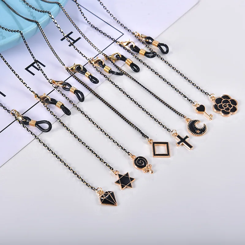 

Delicate Mask Sunglass Chains For Women Unique Black Flower Cross Moon Star Tassel PendantEyeglass Chains Lanyard Accessories