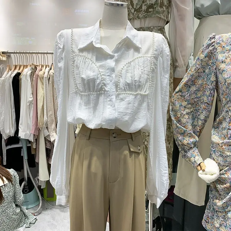 

2021 New Autumn Office Ladies Loose Solid Color Shirts Fashion Women Long Puff Sleeve Beading Single Breasted Blouses Tops Q328