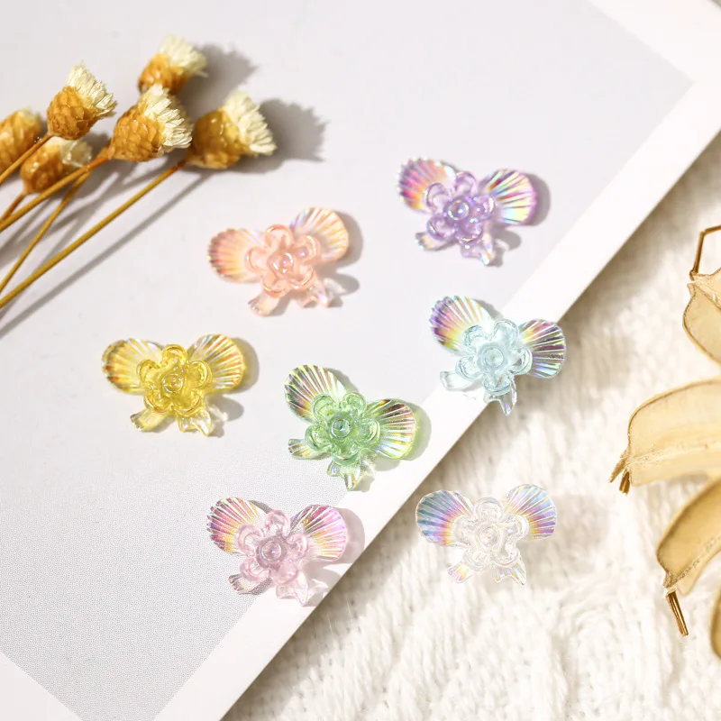 

8*11mm 30pcs New Nail Art Small Flower Aurora Bowknot Plated Color AB Three-dimensional Color Rainbow All-match Nail Decoration