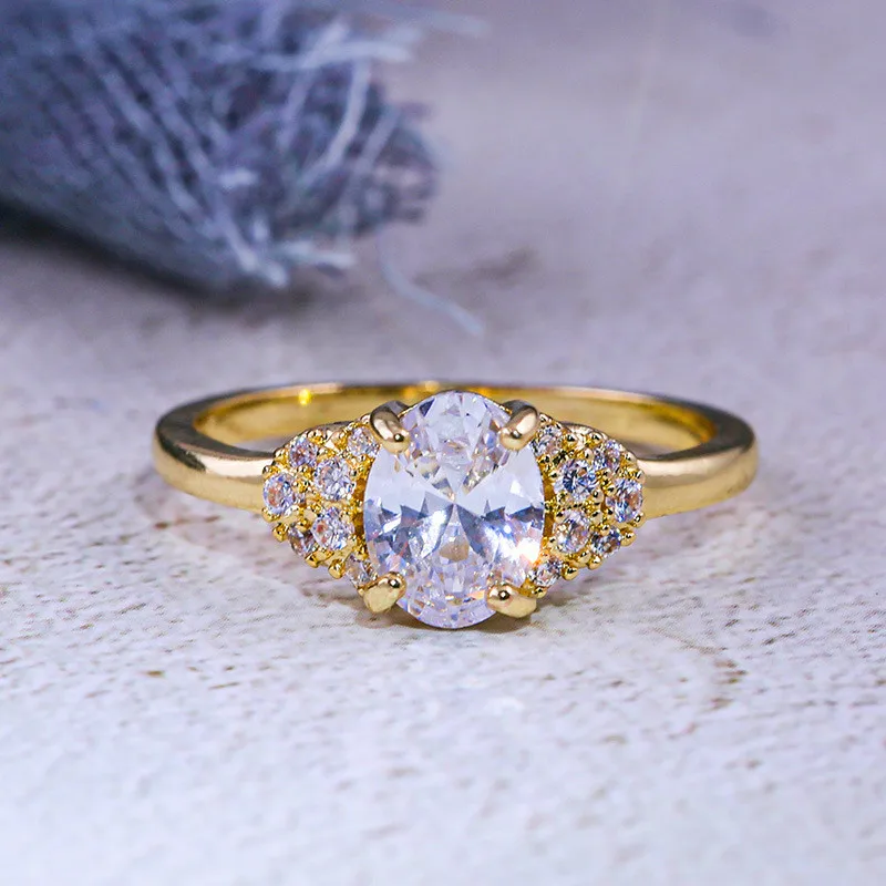 Роскошное женское кольцо с овальным цирконом модное обручальное желтого и