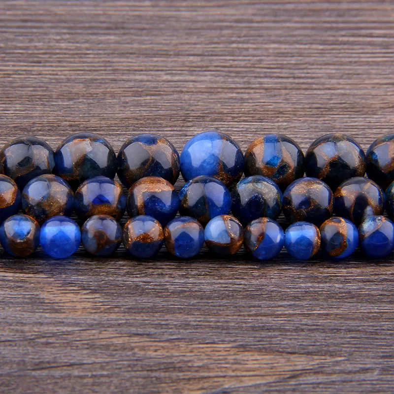 Голубые бусины из перегородчатого золота с покрытием драгоценных камней