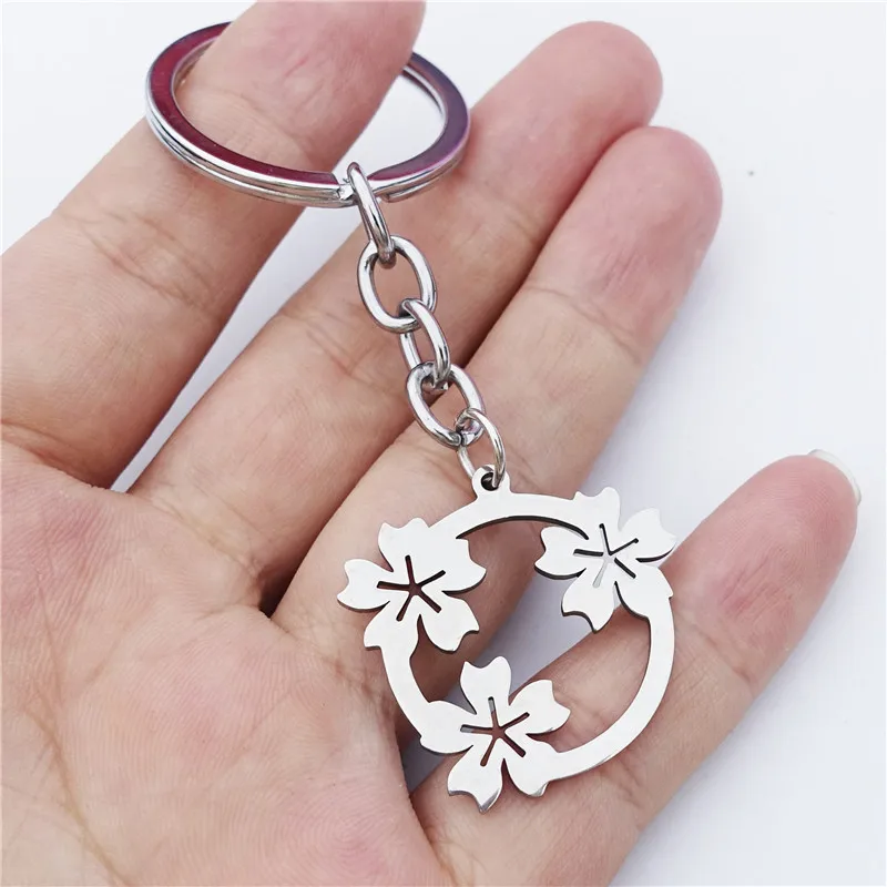 

12 Pieces Plum Blossom Flower Keyrings Stainless Steel Wild Frangipani Flower Keychain Plant Fashion Lily Jewelry Wholesale Pack